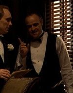 INT DAY: DON'S OFFICE. DON CORLEONE (pleased): He came all the way from California to come to the wedding. I told ya he was goin' to come.
